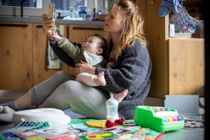 Mom,And,Baby,Having,Fun,In,Messy,House,And,Looking