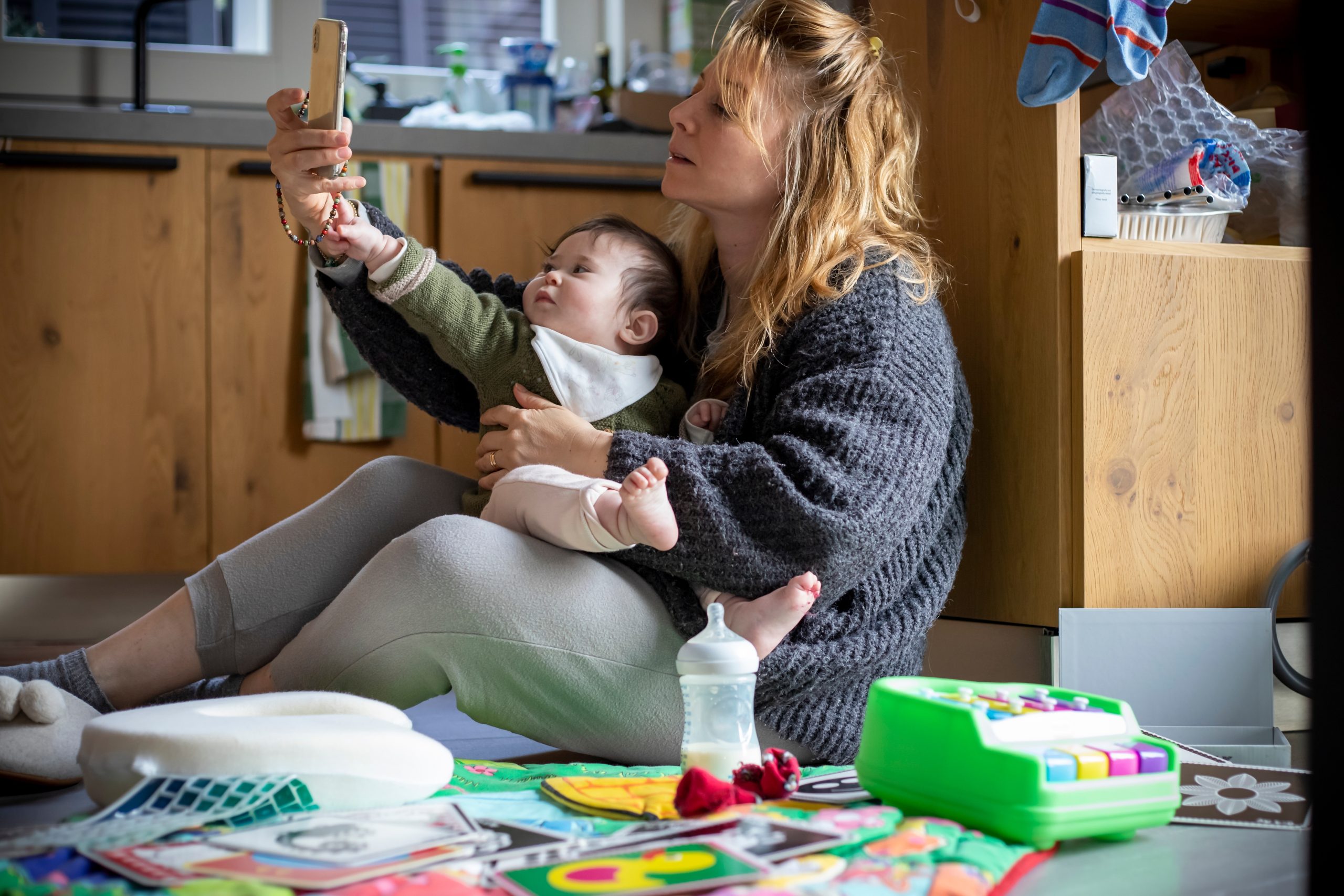 Mom,And,Baby,Having,Fun,In,Messy,House,And,Looking